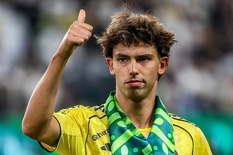 Nassr's Portuguese forward #79 Joao Felix gestures during the line-up before the Saudi Pro League football match between Al-Nassr and Al-Riyadh SC at Al-Awwal Park in Riyadh on September 20, 2025.