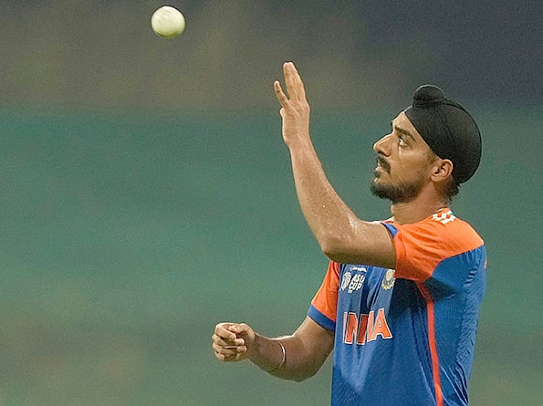 India's Arshdeep Singh catch a ball during the Asia Cup cricket match against Oman at Zayed Cricket Stadium in Abu Dhabi, on Friday, September 19, 2025. 