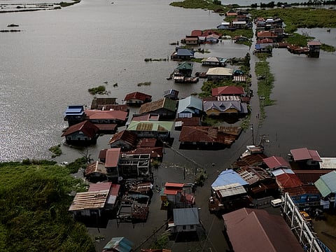A drone view shows homes inundated by high tide and flooding in Calumpit, Bulacan, Philippines