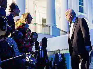 US President Donald Trump speaks to members of the media on the South Lawn of the White House in Washington, DC, on Saturday, September 20, 2025.