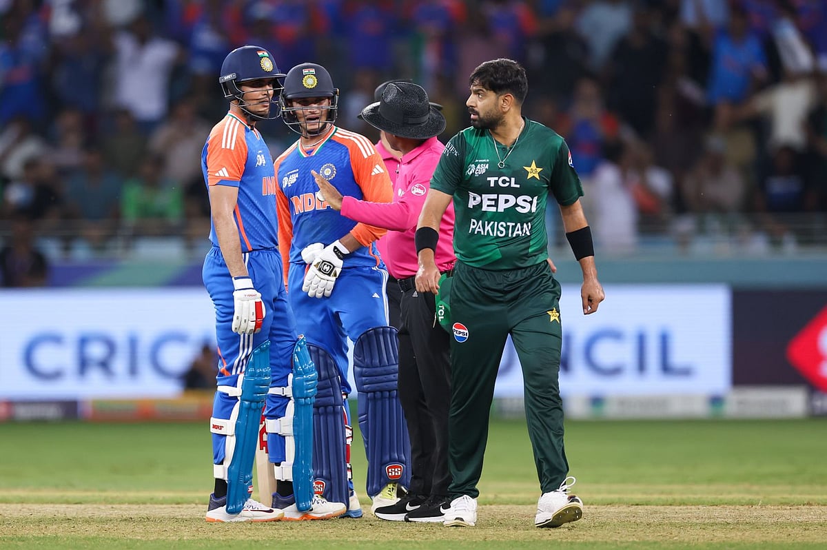 Indian opener Abhishek Sharma and Pakistan bowler Haris Rauf share heated moments during their Asia Cup match at Dubai International Stadium on Sunday. 