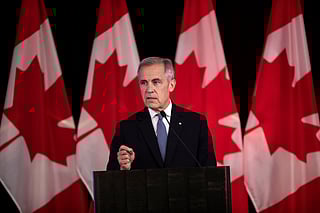 FILE - Canada Prime Minister Mark Carney delivers opening remarks at the Liberal caucus in Edmonton, Alberta, Canada on Wednesday, Sept. 10, 2025. 