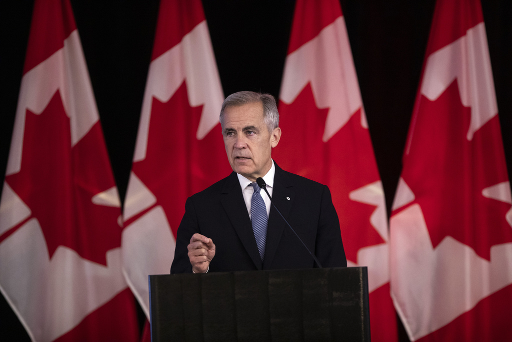 FILE - Canada Prime Minister Mark Carney delivers opening remarks at the Liberal caucus in Edmonton, Alberta, Canada on Wednesday, Sept. 10, 2025. 