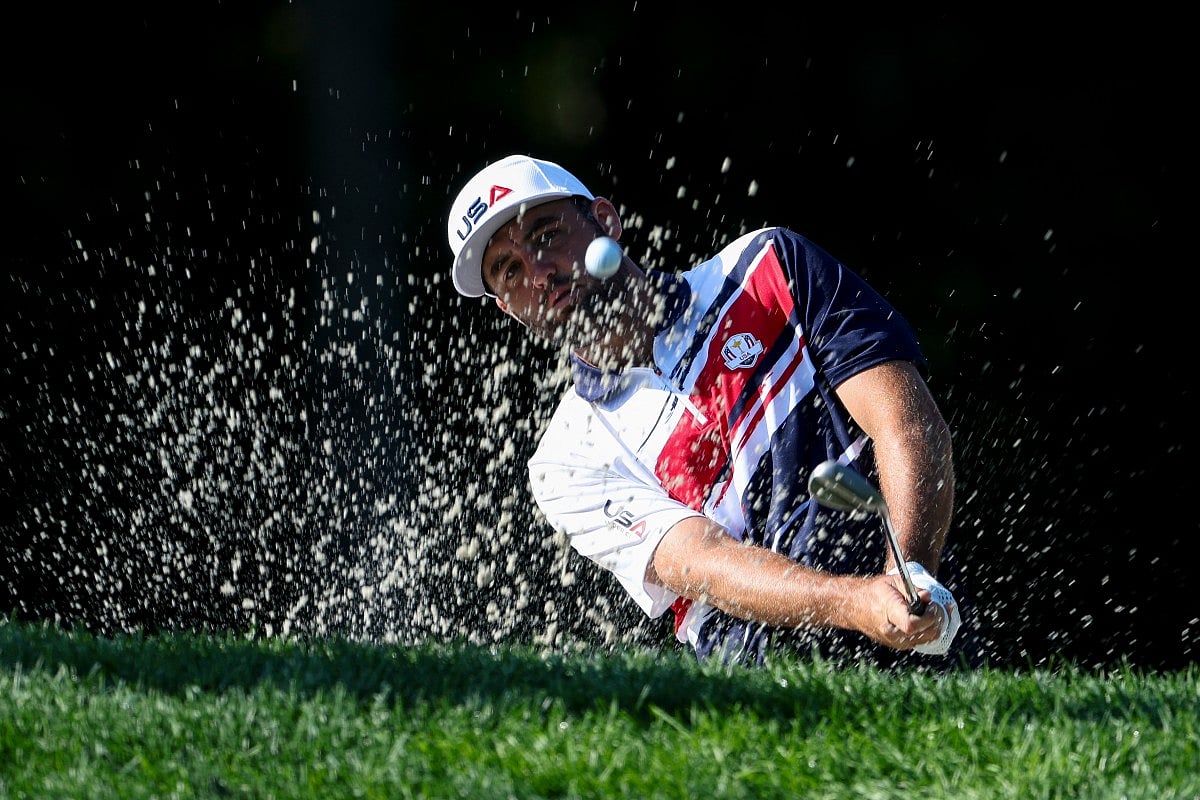Scottie Scheffler of Team United States plays a shot from a bunker on the second hole during a practice round prior to the Ryder Cup 2025 at Black Course at Bethpage State Park Golf Course on September 22, 2025 in Farmingdale, New York.