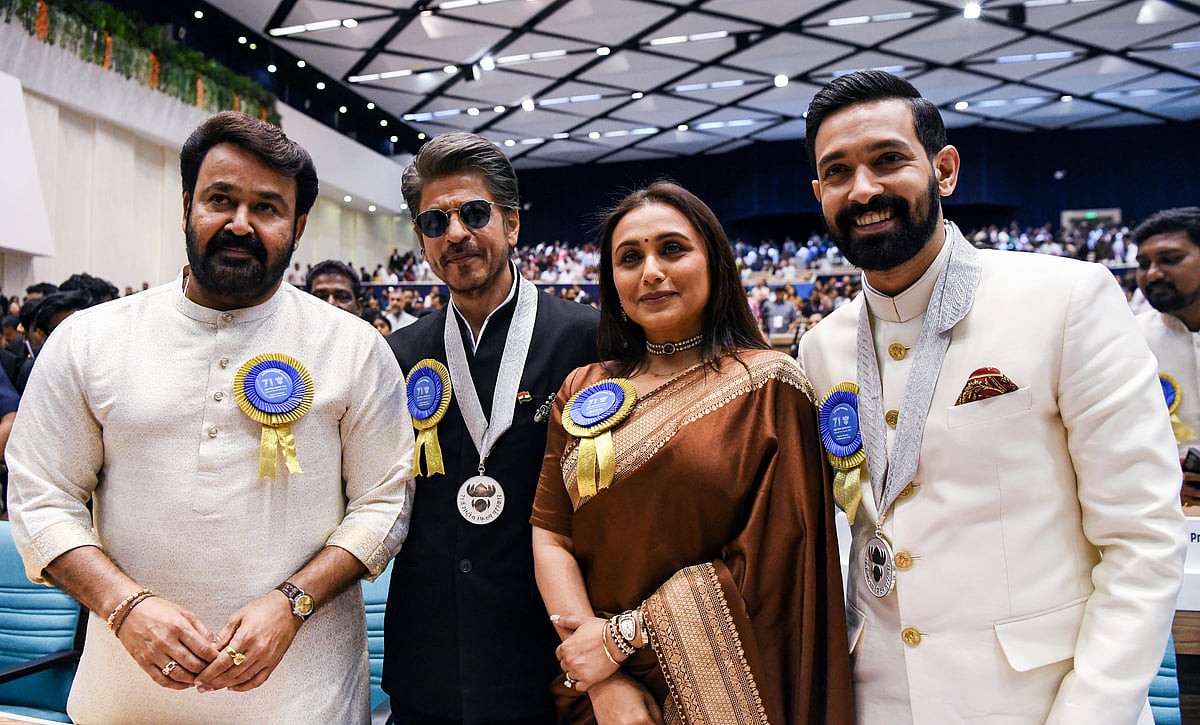 Actors Mohanlal, Shah Rukh Khan, Rani Mukerji, and Vikrant Massey pose together during the 71st National Film Awards ceremony at Vigyan Bhawan in New Delhi.