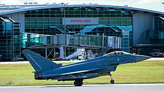 A Eurofighter Typhoon (30 33) of the German Air Force departs from the military air base in Laage, south of Rostock, northeastern Germany during a demonstration as part of a press day on September 23, 2025.