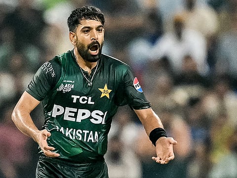 Pakistan's Haris Rauf reacts after a delivery during the Asia Cup 2025 Super Four T20I match against Sri Lanka at the Sheikh Zayed Cricket Stadium in Abu Dhabi on September 23, 2025. 
