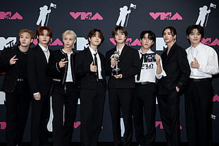 Bang Chan, Lee Know, Felix, Han, Seungmin, Changbin, Hyunjin and I.N of Stray Kids pose in the press room with their Best K-Pop award for "S-Class" at the 2023 MTV Video Music Awards at Prudential Center on September 12, 2023 in Newark, New Jersey.