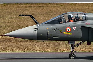 The Indian Air Force (IAF) HAL Tejas fighter jet prepares to take off during Aero India 2025, a military aviation exhibition at the Yelahanka Air Force Station in Bengaluru on February 13, 2025.  