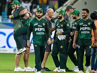 Pakistan players celebrate after defeating Bangladesh in the Asia Cup 2025 Super Four T20I match at the Dubai International Stadium on September 25, 2025. 