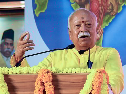 Rashtriya Swayamsevak Sangh (RSS) chief Mohan Bhagwat (L) and India's former President Ram Nath Kovind attend the centenary celebrations of the Hindu nationalist organisation at Reshimbagh Ground in Nagpur on October 2, 2025. 