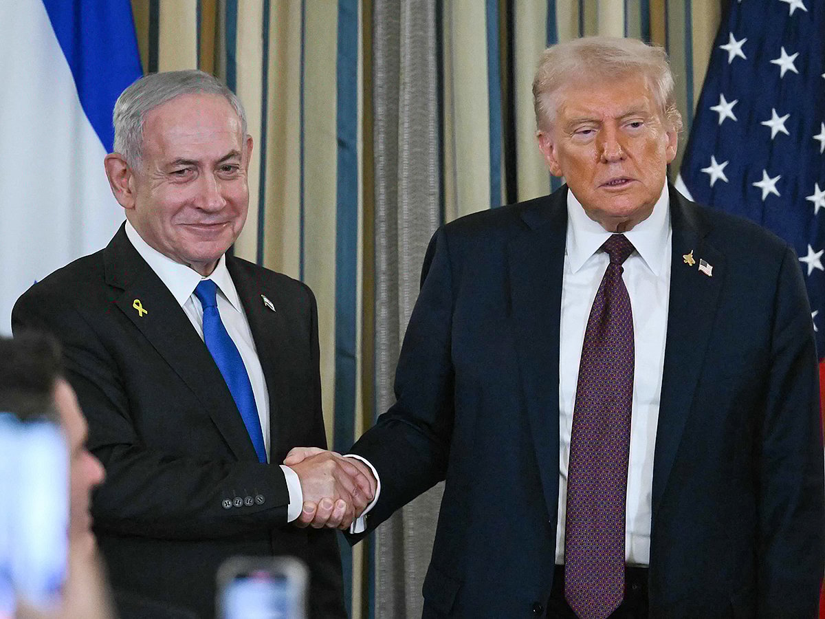 US President Donald Trump and Israeli Prime Minister Benjamin Netanyahu shake hands at the conclusion of a joint press conference in the State Dining Room of the White House in Washington, DC on September 29, 2025. 