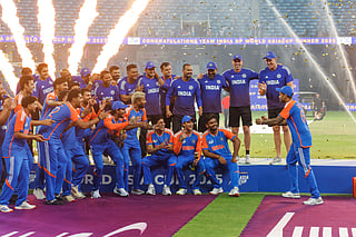 Indian captain Surya Kumar Yadav and team celebrate with an imaginary trophy after their win in the DP World Asia Cup final defeating Pakistan at Dubai International stadium on Sunday.