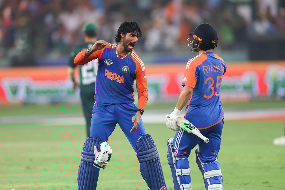 India's Tilak Varma and Rinku Singh celebrate their win over Pakistan in the Asia Cup final at the Dubai International stadium on Sunday. 