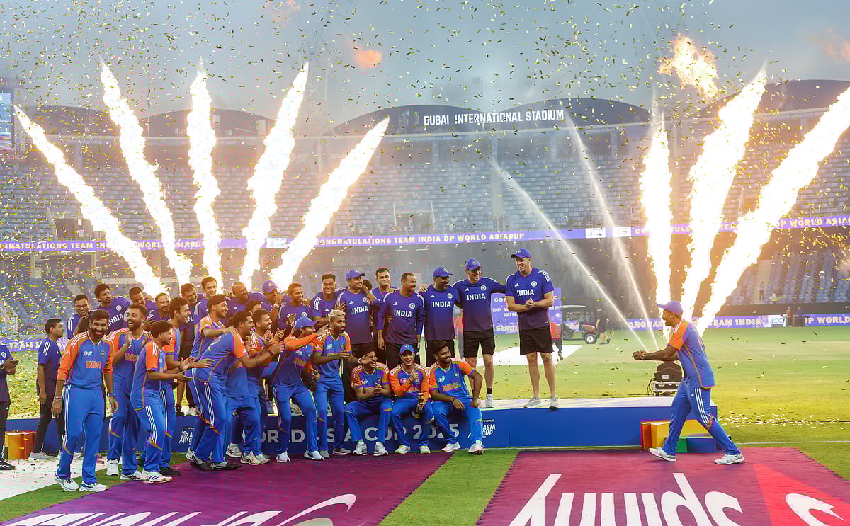 Indian captain Surya Kumar Yadav and team celebrate with an imaginary trophy after their win in the DP World Asia Cup final at Dubai International stadium on Sunday.