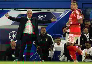 Benfica's Portuguese head coach Jose Mourinho gestures during the UEFA Champions League, league phase football match between Chelsea and Benfica at Stamford Bridge in London on September 30, 2025.