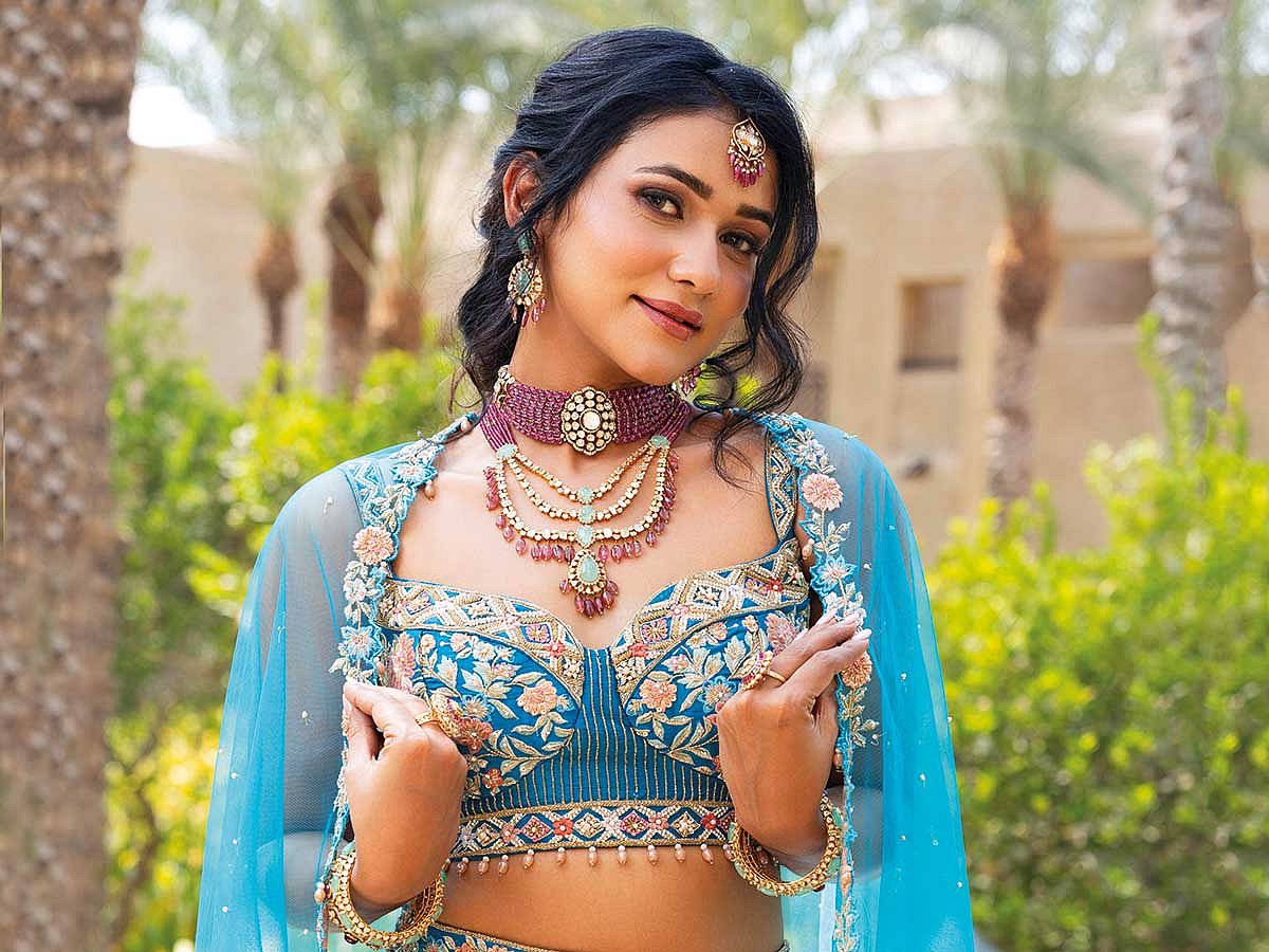 Ready for Mehendi: Channel a fun vibe in this vibrantly embroidered choice, and pair it with  colourful jewellery.