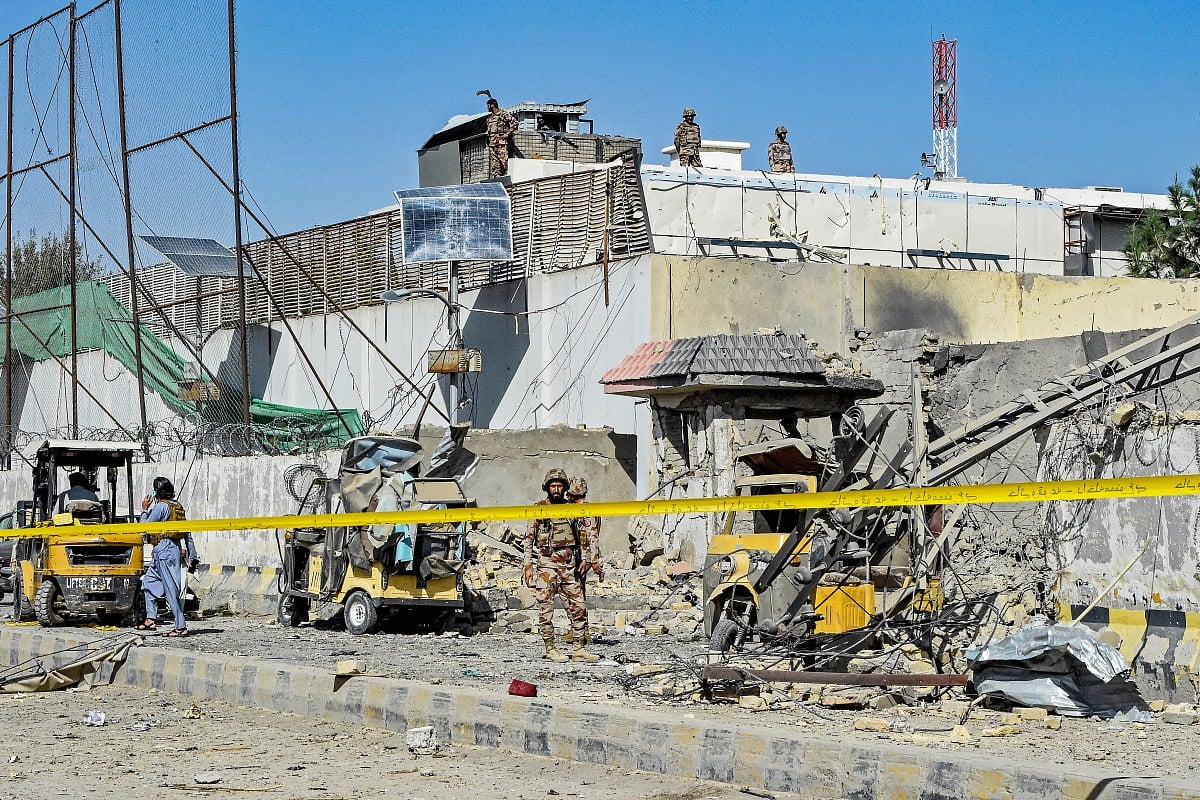 Security personnel inspect an explosion site outside the Frontier Corps (FC) headquarters in Quetta on September 30, 2025.