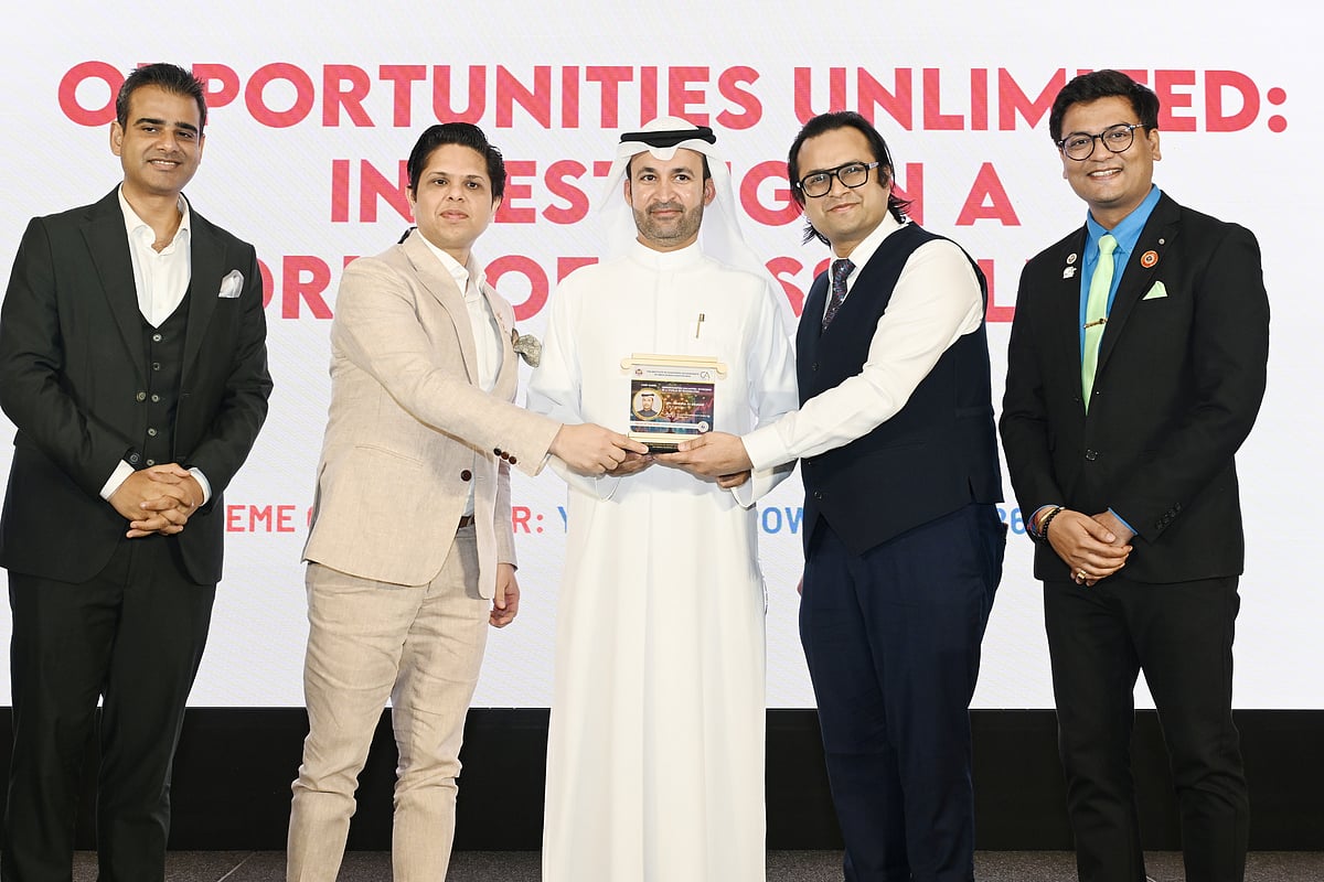 Abdulla Al Abdouli being presented with a memento by CA Jai Prakash Agarwal (to his left) and Ankur Aggarwal at the Investment Summit in Dubai. 