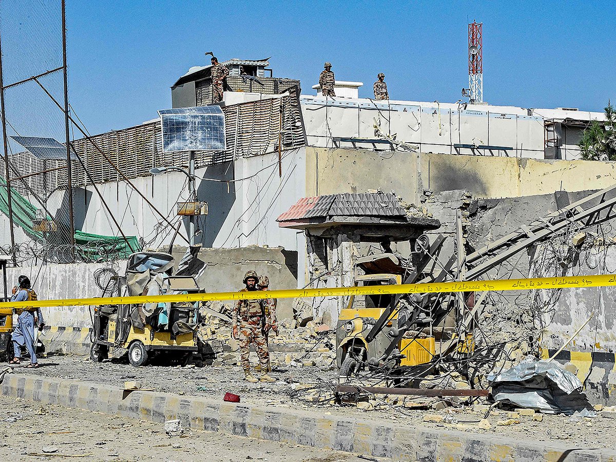Security personnel inspect an explosion site outside the Frontier Corps (FC) headquarters in Quetta, Pakistan, on September 30, 2025. 