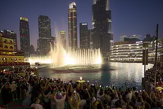 Huge crowd gathered to was Dubai fountain re opening in front of Burj Khalifa.  