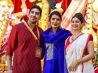 Mumbai’s festive season turned star-studded as Bollywood’s most prominent names gathered at the North Bombay Sarbojanin Durga Puja pandal, hosted by Rani Mukerji and Kajol’s family. Adding a special sparkle to the celebration this year was Priyanka Chopra, who is currently in Mumbai for an event. Above, Priyanka Chopra Jonas joins Tanishaa Mukerji and director Ayan Mukerji at Durga Puja celebrations in Mumbai.