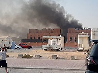 Smoke billowing after an Israeli attack in Qatar's capital Doha on September 9, 2025. 