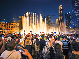 Crowds gather to watch the Dubai Fountain’s first show after its reopening on Wednesday. The five-month refurbishment has introduced a brand-new floor and several exciting upgrades.