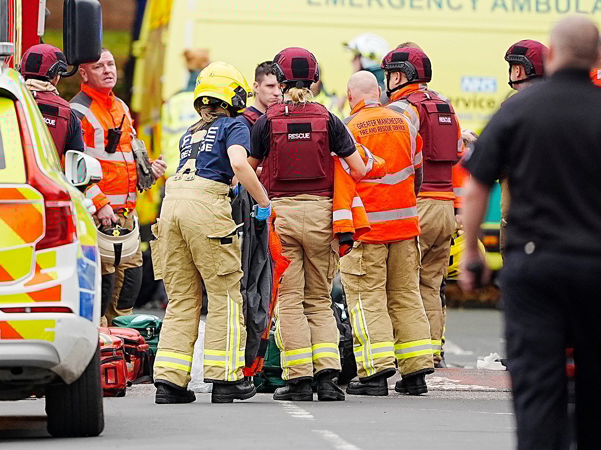 Emergency services at the scene of a stabbing at Heaton Park Hebrew Congregation synagogue, in Crumpsall, Manchester, England, on Thursday October 2, 2025.  