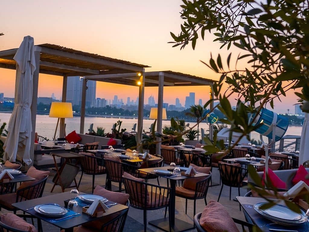 Perfect for lunch with fab daytime views, or  you can stick around for sunset magic that turns the sky golden at Ibn AlBahr at the Creek 
