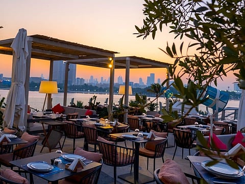 Perfect for lunch with fab daytime views, or  you can stick around for sunset magic that turns the sky golden at Ibn AlBahr at the Creek 