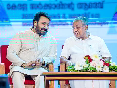Mohanlal (left) with Kerala CM Pinarayi Vijayan on stage during the the state government’s public felicitation for the actor at the Central Stadium in Thiruvananthapuram on Saturday.