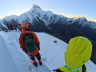 The man slipped uncontrollably as witnesses screamed for help.