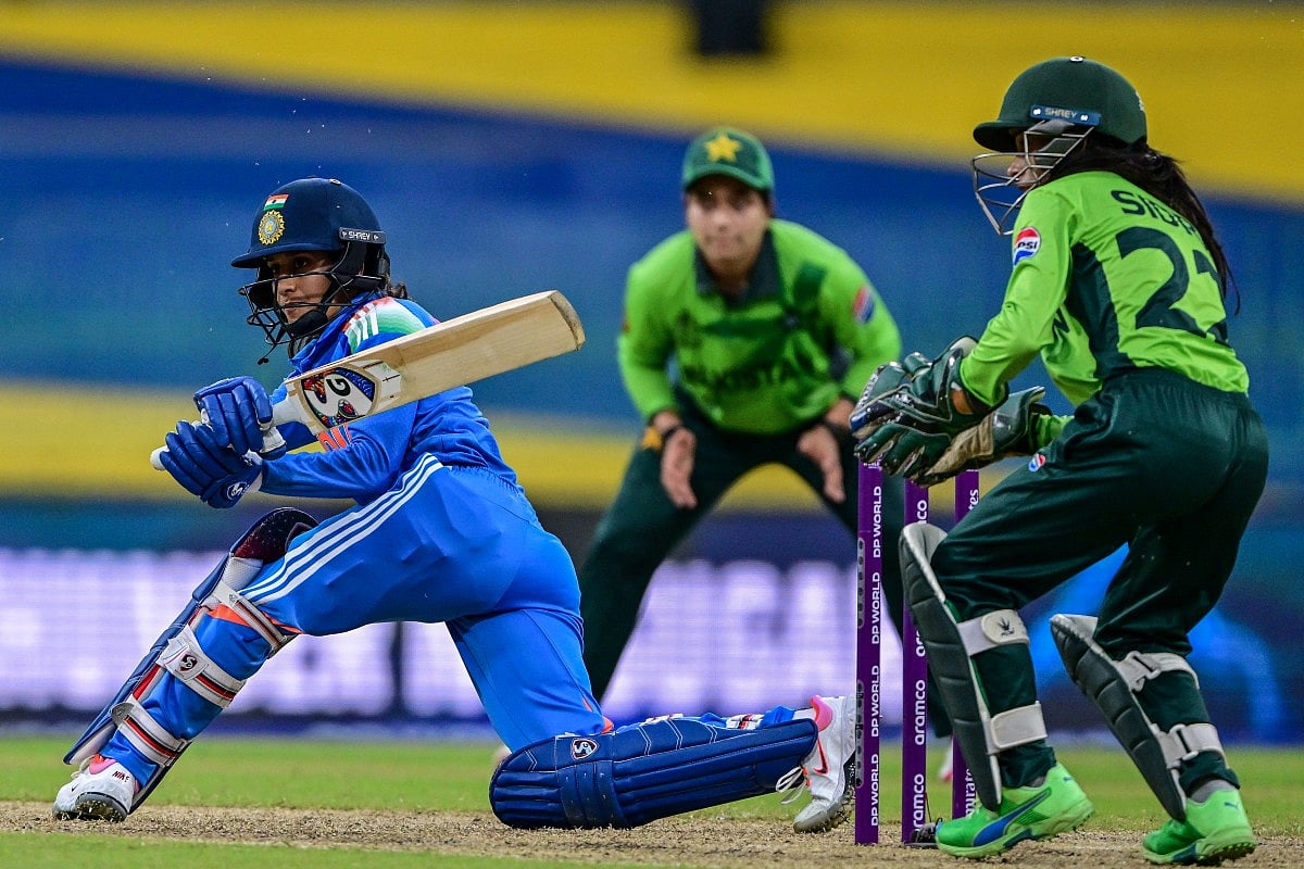 India's Jemimah Rodrigues (L) plays a shot during the ICC Women's Cricket World Cup 2025 one-day international (ODI) match between India and Pakistan at the R. Premadasa International Cricket Stadium in Colombo on October 5, 2025.