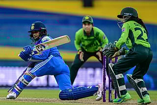 India's Jemimah Rodrigues (L) plays a shot during the ICC Women's Cricket World Cup 2025 one-day international (ODI) match between India and Pakistan at the R. Premadasa International Cricket Stadium in Colombo on October 5, 2025.