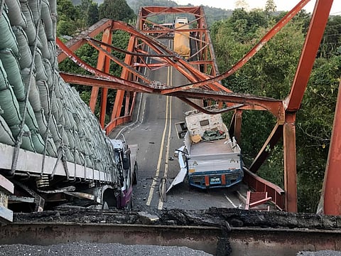Piggatan bridge collapse: Trucks stranded, route closed