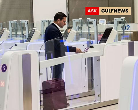 Passengers using smart gates at Dubai International Airport (DXB) Terminal - 3.