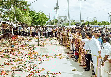 People gather at the place where the stampede occurred.