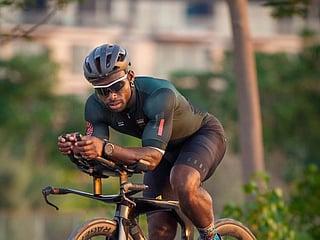 Dubai-based athlete Ghani Souleymane takes on challenge of 100 triathlons in 100 days to support children battling cancer.