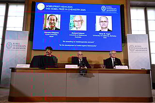 Heiner Linke, Chair of the Nobel Committee for Chemistry, Hans Ellegren, Secretary General of The Royal Swedish Academy of Sciences, and Olof Ramstroem, Member of the Nobel Committe for Chemistry, address a press conference to announce Japan's Susumu Kitagawa, UK-born Richard Robson and American-Jordanian Omar M. Yaghi as the winners of the 2025 Nobel Prize in Chemistry at the Royal Swedish Academy of Sciences in Stockholm, Sweden, on October 8, 2025.