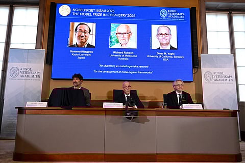 Heiner Linke, Chair of the Nobel Committee for Chemistry, Hans Ellegren, Secretary General of The Royal Swedish Academy of Sciences, and Olof Ramstroem, Member of the Nobel Committe for Chemistry, address a press conference to announce Japan's Susumu Kitagawa, UK-born Richard Robson and American-Jordanian Omar M. Yaghi as the winners of the 2025 Nobel Prize in Chemistry at the Royal Swedish Academy of Sciences in Stockholm, Sweden, on October 8, 2025.