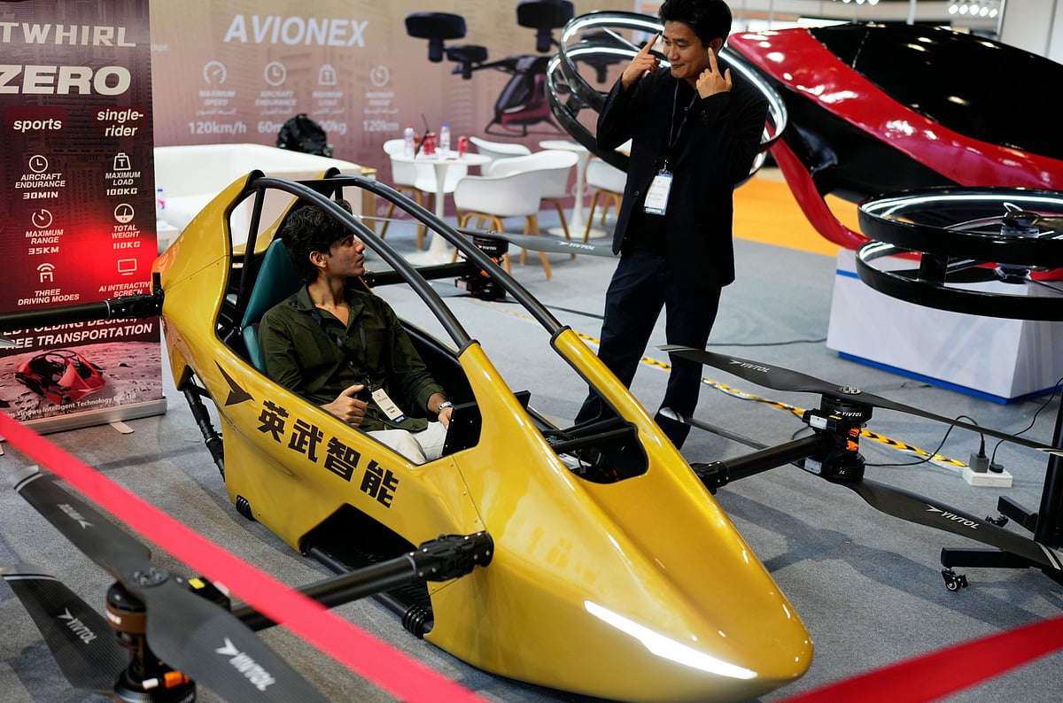 A visitor tries the Yivtol S-Zero, a Chinese single-seat aircraft, at the DroneTech Dubai 2025 exhibition at Festival Arena, Dubai Festival City — the region’s premier event showcasing the latest in drone and UAV technologies from October 7 to 9.