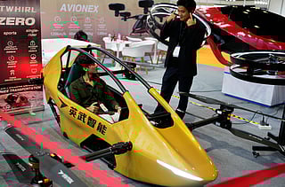 A visitor tries the Yivtol S-Zero, a Chinese single-seat aircraft, at the DroneTech Dubai 2025 exhibition at Festival Arena, Dubai Festival City — the region’s premier event showcasing the latest in drone and UAV technologies from October 7 to 9.