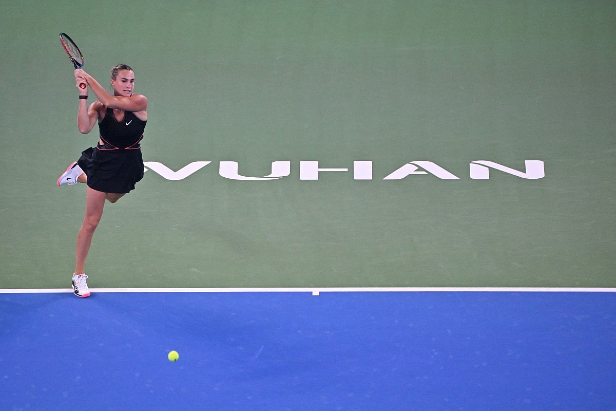 Belarus’ Aryna Sabalenka hits a return to Russia’s Liudmila Samsonova during their women’s singles match at the Wuhan Open tennis tournament in Wuhan, Central China’s Hubei province on October 9, 2025.