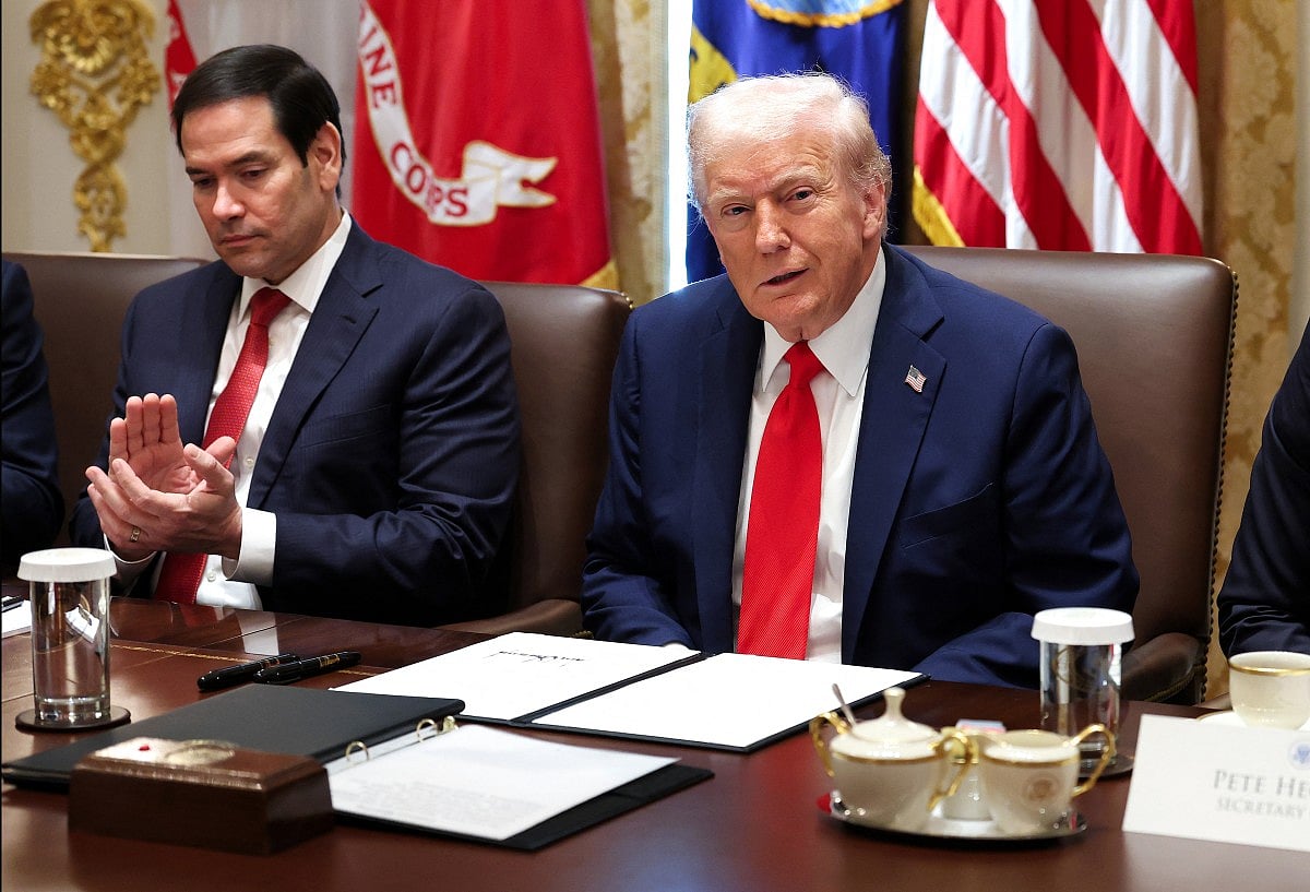 US President Donald Trump, joined by Secretary of State Marco Rubio, speaks during a Cabinet meeting at the White House on October 09, 2025 in Washington, DC. Trump spoke on the Israel and Hamas ceasefire and hostage deal saying the hostages may be released next week.