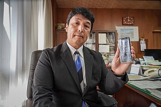 This picture taken on October 7, 2025 shows Toyoake mayor Masafumi Kouki posing for photographs following an interview at City Hall in Toyoake, Aichi prefecture.