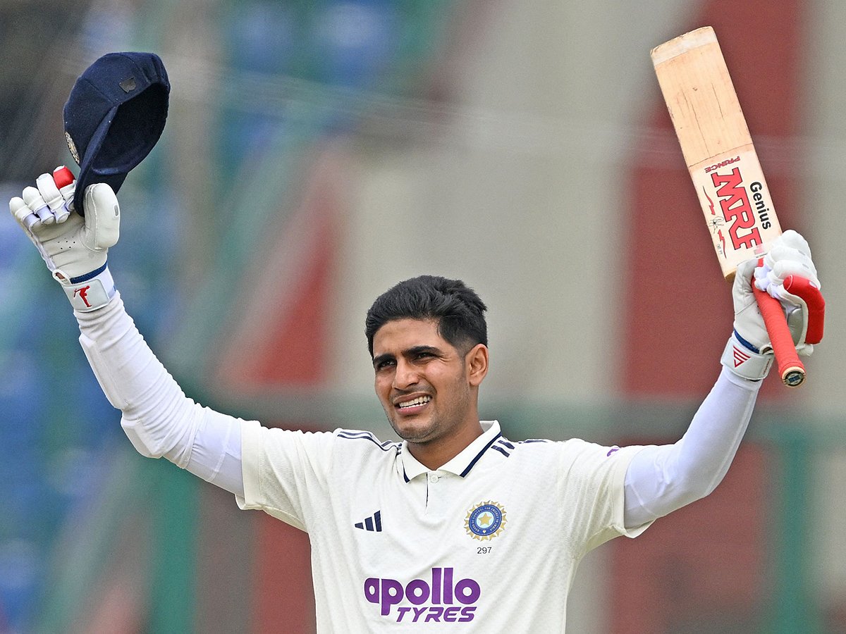 India's captain Shubman Gill celebrates after scoring a century during the second day of the second and last Test against West Indies at the Arun Jaitley Stadium in New Delhi on October 11, 2025. 