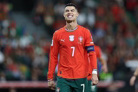 Portugal's forward #16 Cristiano Ronaldo reacts to failing to score from the penalty spot during the 2026 World Cup qualifier Europe zone group F football match between Portugal and Ireland at Jose Alvalade stadium in Lisbon on October 11, 2025.