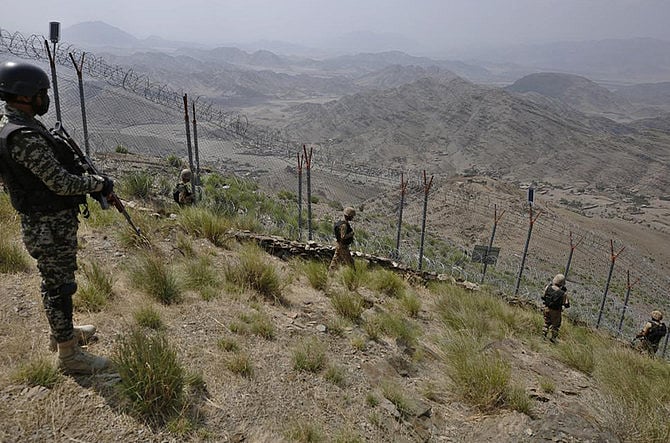 Pakistani soldiers patrolling along Pak-Afghan border in this undated photo. 