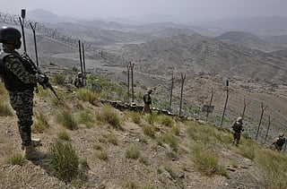 Pakistani soldiers patrolling along Pak-Afghan border in this undated photo. 
